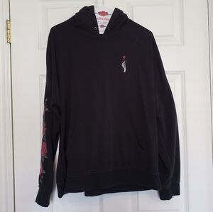ZUMIEZ skeleton hand/ rose print hoodie